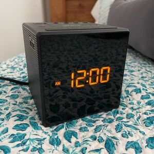 Black Sony Digital Alarm Clock with Orange Display